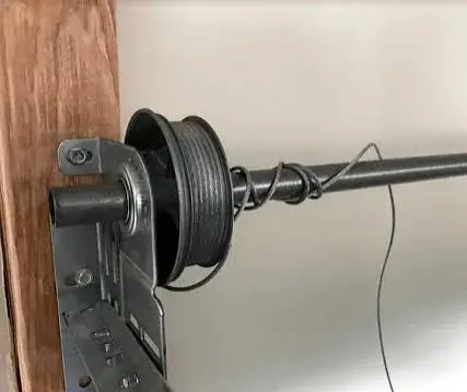 Loose garage door cable on the drum — Catalystx LLC